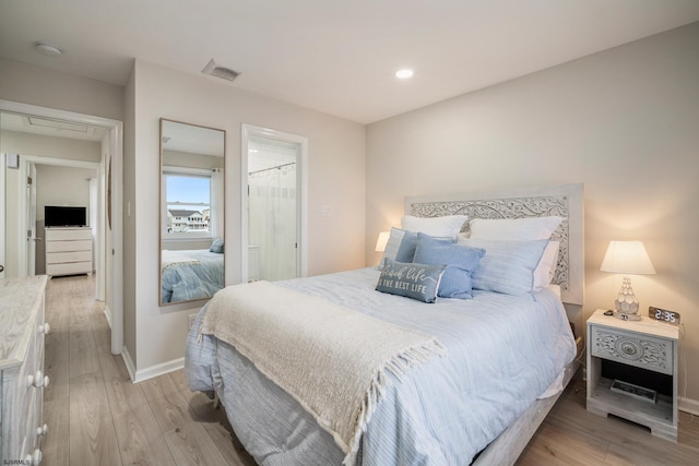 bedroom featuring light wood-type flooring