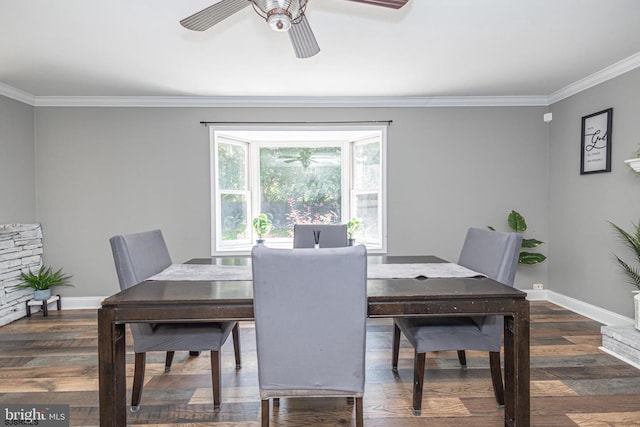 dining space with ornamental molding, dark hardwood / wood-style floors, and ceiling fan