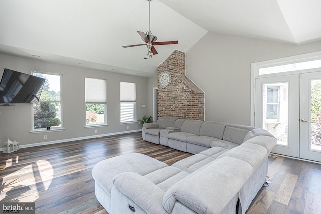 living room featuring ceiling fan, high vaulted ceiling, dark hardwood / wood-style flooring, and french doors