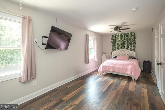 bedroom featuring dark hardwood / wood-style floors and ceiling fan