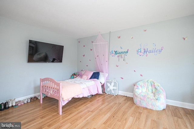 bedroom featuring light hardwood / wood-style floors