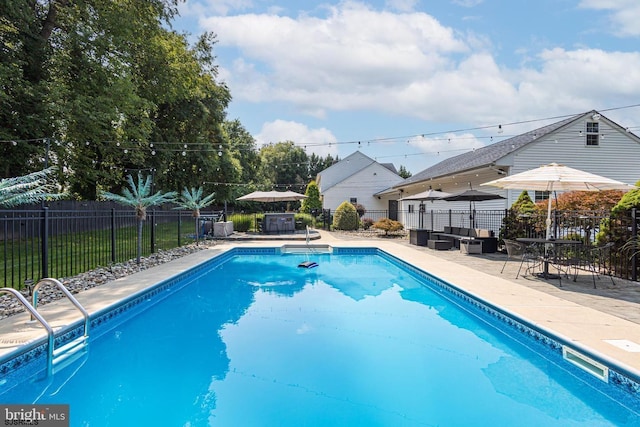 view of pool with an outdoor hangout area and a patio