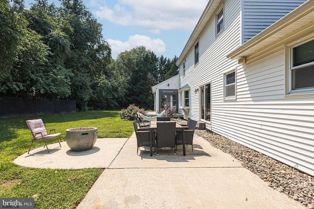 view of patio / terrace featuring an outdoor fire pit