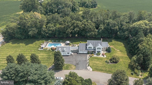 birds eye view of property featuring a rural view