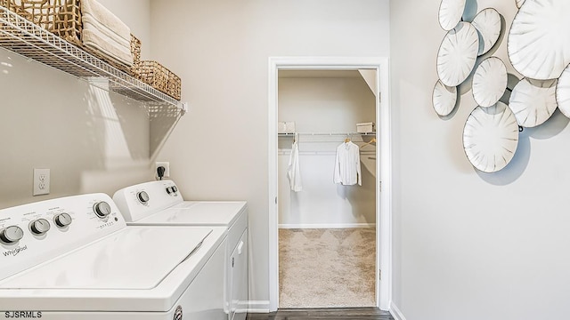 washroom featuring washer and dryer and carpet flooring