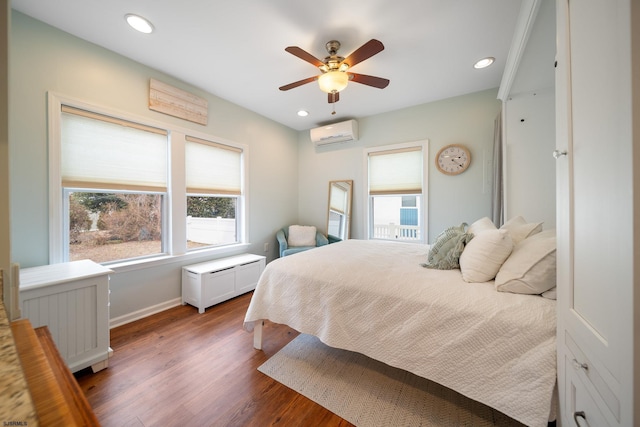 bedroom with ceiling fan, radiator, a wall mounted air conditioner, and dark hardwood / wood-style floors