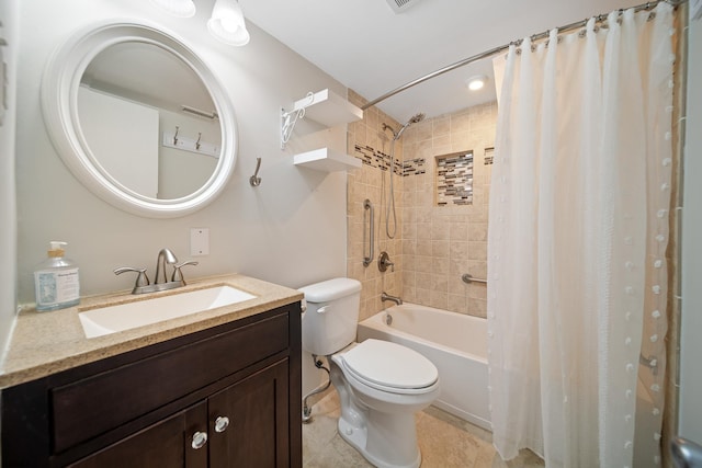 full bathroom featuring tile patterned flooring, vanity, shower / bath combo with shower curtain, and toilet