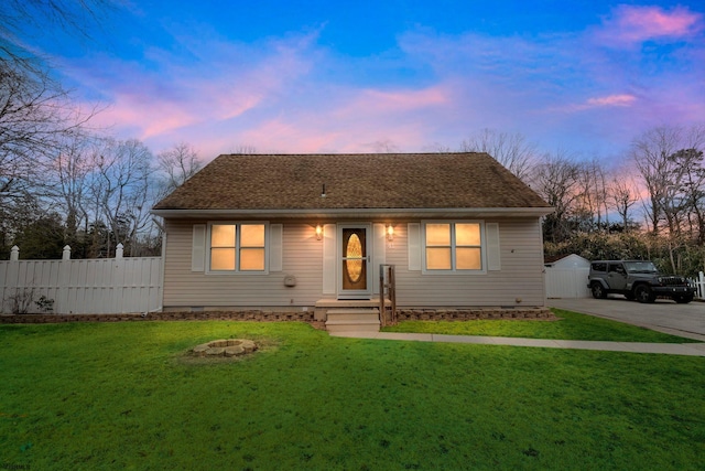 view of front facade with a yard