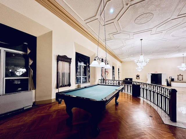 recreation room featuring an inviting chandelier, parquet floors, crown molding, and pool table