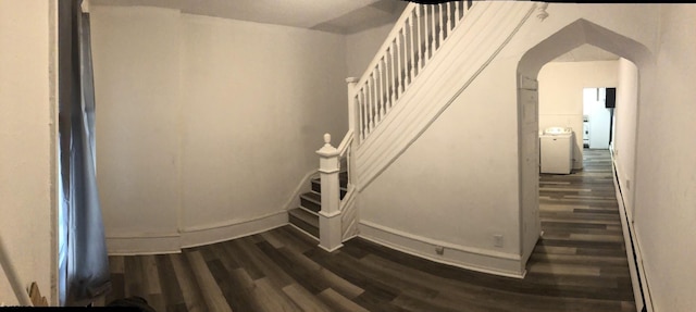 stairs with hardwood / wood-style floors