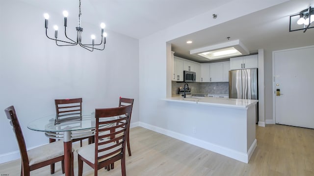 3101 Boardwalk Unit 1512-2, Chelsea Heights, NJ 08401 - dining area with light hardwood / wood-style floors