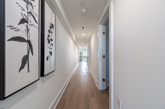 hall featuring wood-type flooring