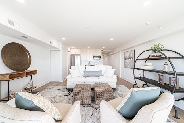 living room featuring light hardwood / wood-style floors