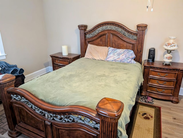 bedroom featuring light hardwood / wood-style floors