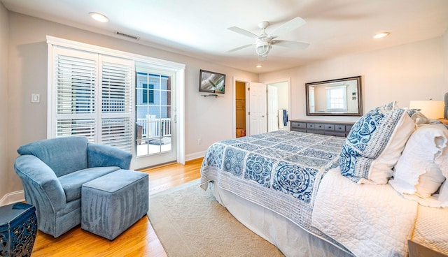 bedroom with light wood-style flooring, recessed lighting, visible vents, baseboards, and access to exterior