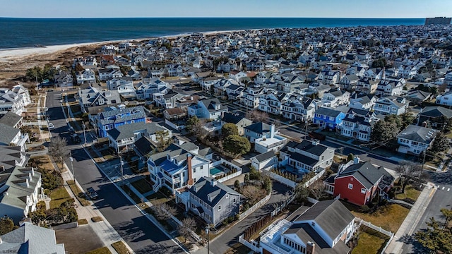 aerial view featuring a residential view and a water view