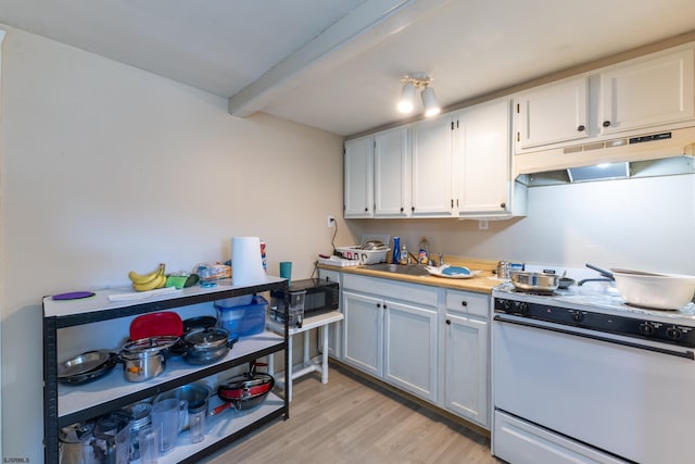 kitchen featuring sink, light wood-type flooring, beamed ceiling, white electric range oven, and white cabinets