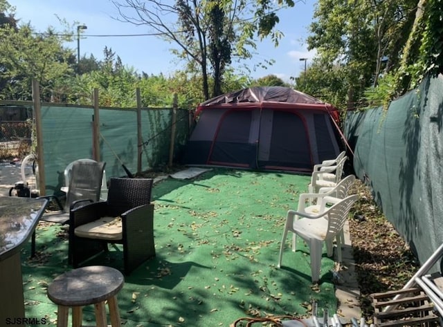 view of yard with a fenced backyard