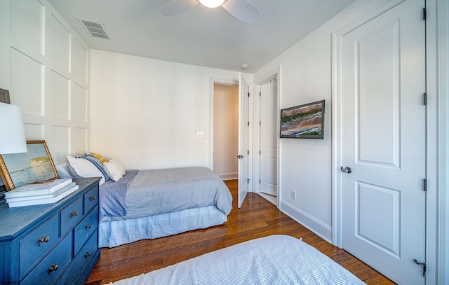 bedroom featuring dark wood-type flooring and ceiling fan