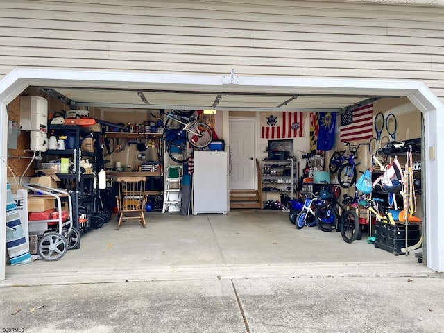 garage featuring white refrigerator