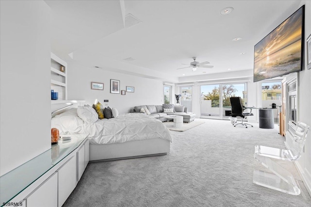 bedroom featuring access to exterior, a ceiling fan, recessed lighting, and carpet floors