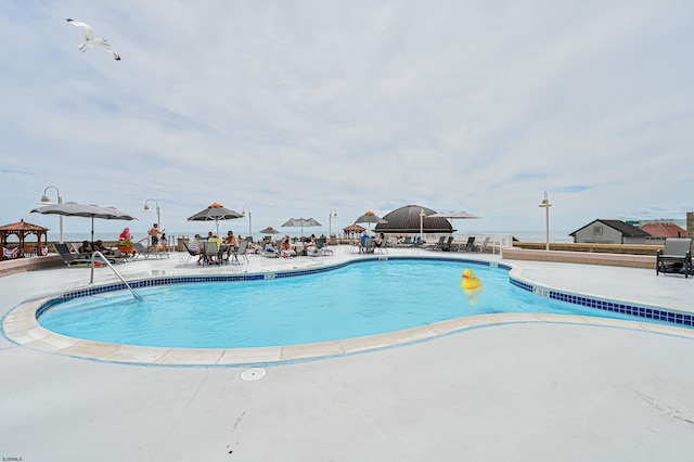 pool with a patio