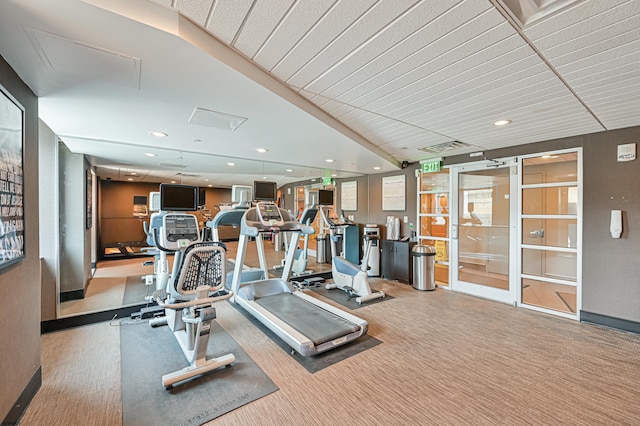 gym featuring recessed lighting, light colored carpet, and visible vents