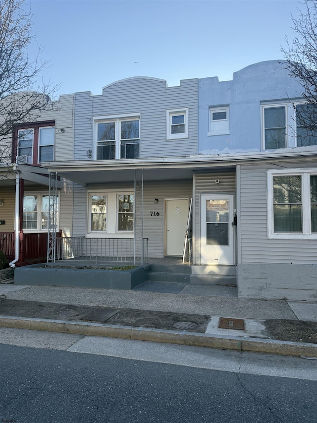 multi unit property featuring covered porch