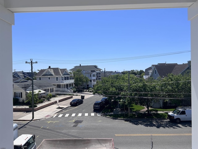48 Wesley Rd, Ocean City, NJ 08226 - view of asphalt road with curbs, sidewalks, and a residential view