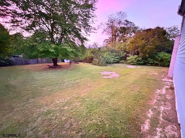view of yard featuring fence