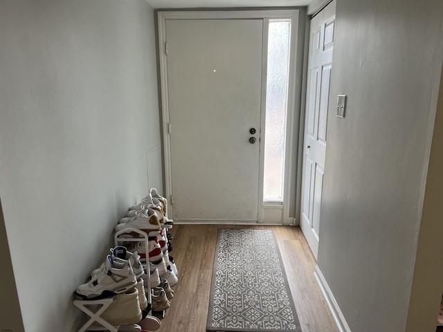 doorway featuring light wood-style floors