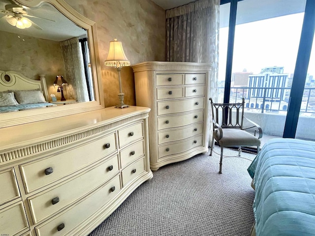 bedroom featuring light colored carpet