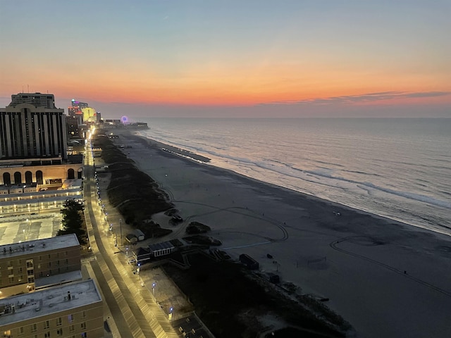 water view featuring a view of the beach and a city view