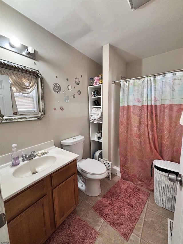 bathroom with a shower with shower curtain, visible vents, vanity, and toilet