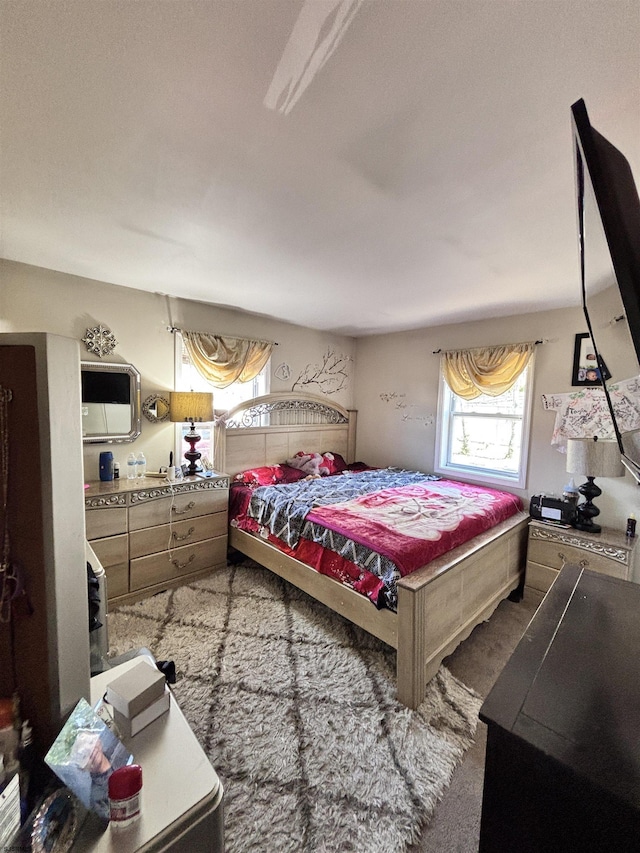 bedroom featuring carpet floors