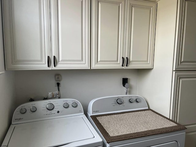 washroom with cabinet space and hookup for an electric dryer