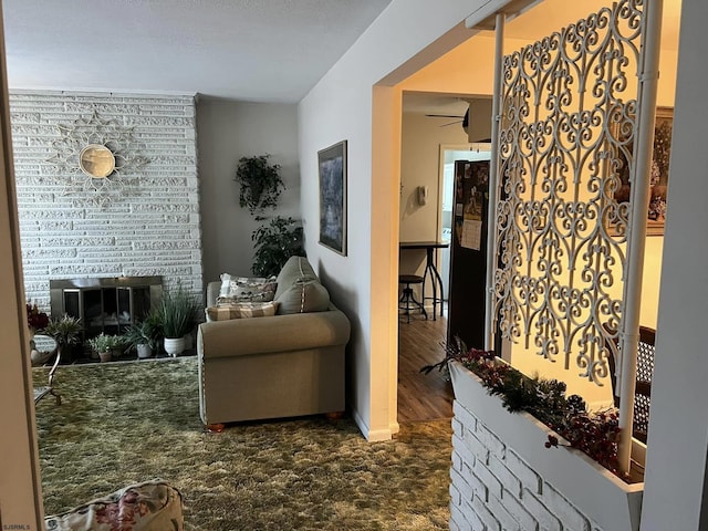 living room featuring a large fireplace