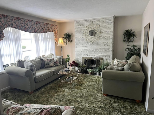 living area with dark carpet and a fireplace