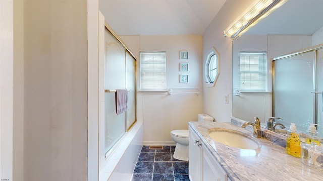 bathroom with visible vents, toilet, vanity, baseboards, and tile patterned floors