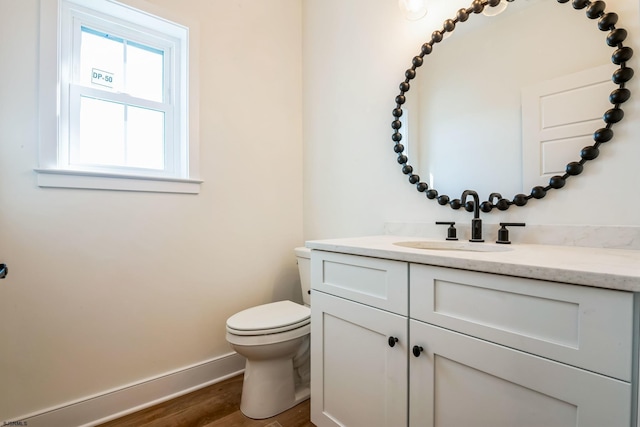 22 Roosevelt, Ocean City, NJ 08226 - bathroom with baseboards, vanity, toilet, and wood finished floors