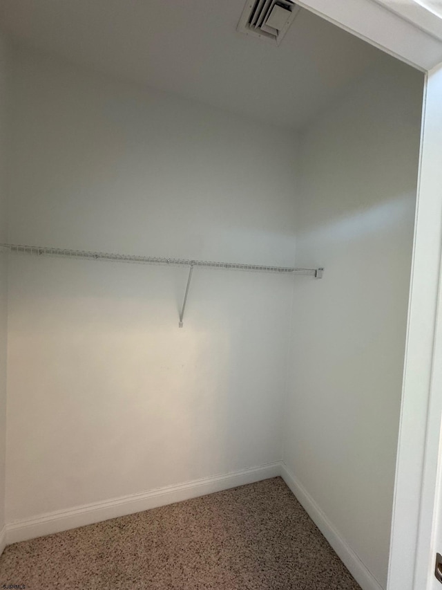 walk in closet with visible vents