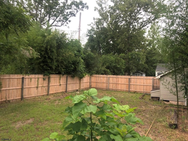 view of yard featuring a fenced backyard