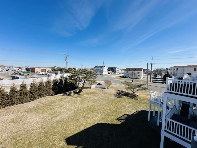 view of yard featuring a residential view