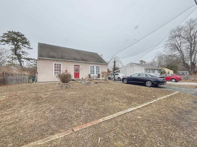 view of front of house with fence