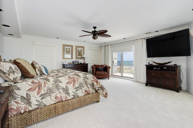 bedroom with access to outside, light colored carpet, ceiling fan, and visible vents