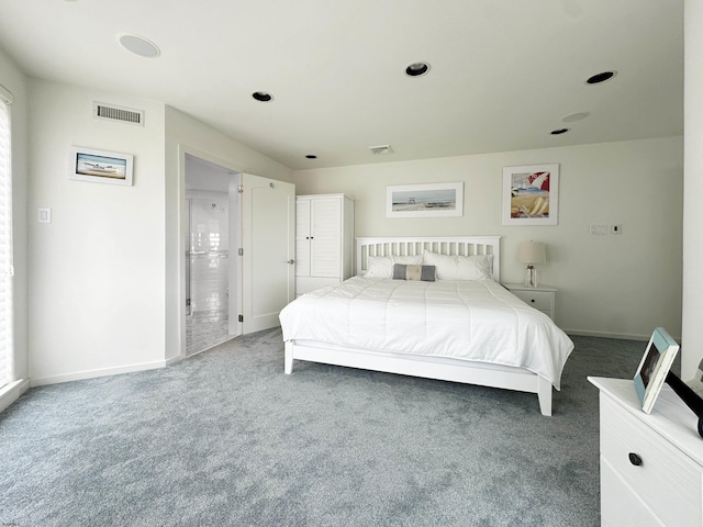 bedroom featuring carpet flooring, visible vents, and baseboards