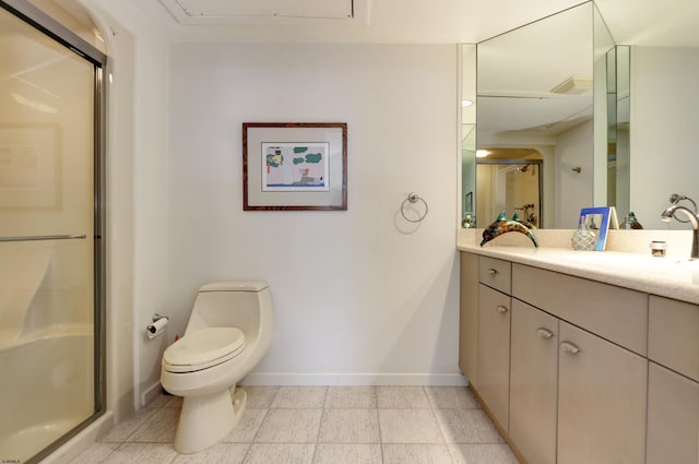 full bathroom featuring a stall shower, vanity, toilet, and baseboards