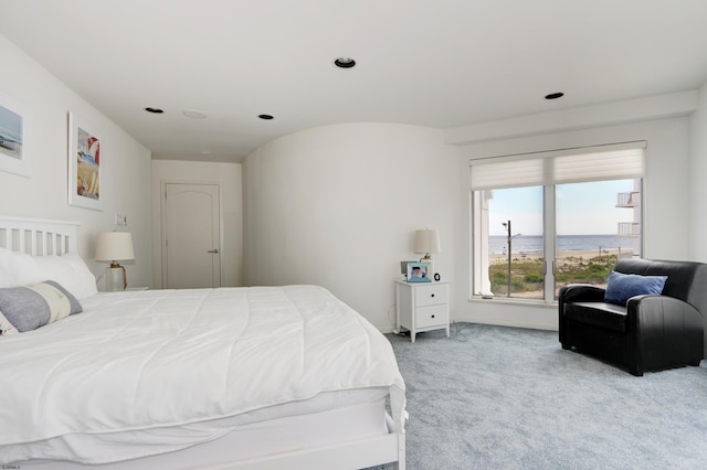 bedroom with carpet flooring and baseboards