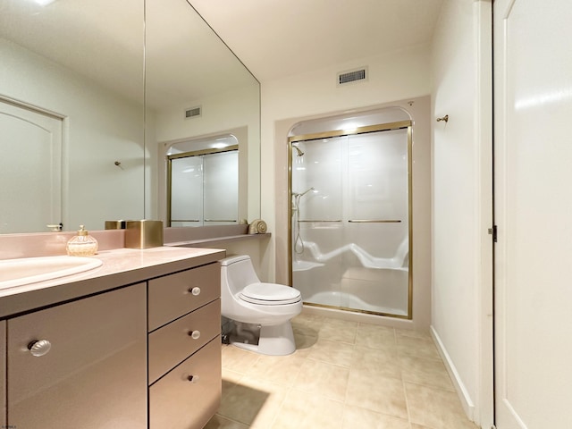 bathroom featuring a stall shower, visible vents, vanity, and toilet