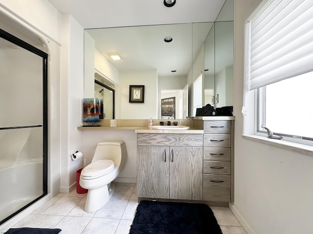 full bathroom featuring toilet, plenty of natural light, a shower stall, and vanity